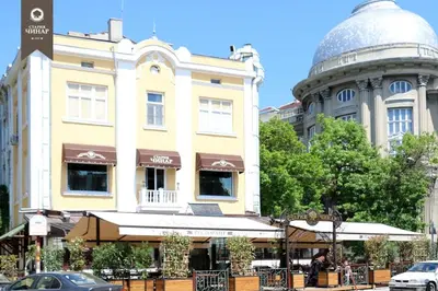 a building with a dome on top of it at Varna Moreto in Varna City