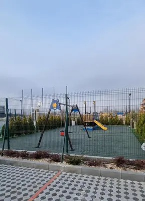 an empty playground with a playground at АМИРА апартамент за гости - AMIRA guest apartment in Burgas City