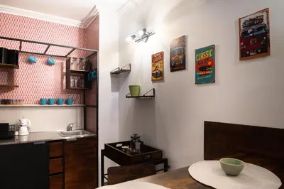 a kitchen with a table and a sink at Zen Studio - Oasis Beach Club in Lozenets