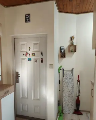 a room with a door and a snowboard on the wall at Dream Loft in the center of Varna in Varna City