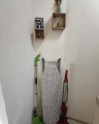 a room with a snowboard and other tools on the wall at Dream Loft in the center of Varna in Varna City