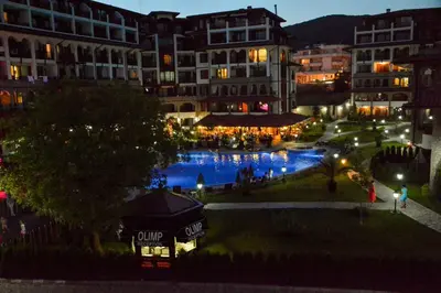a view of a city at night at Private Apartments Olymp in Sveti Vlas