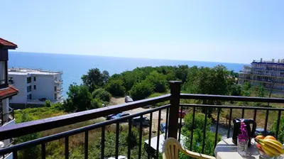 a balcony with a view of the ocean at Бяла Виста Бийч Апартментс A - Byala Vista Beach Apartments A in Byala