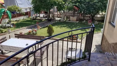 a view of a garden from a balcony of a house at Sunshine Byala 2 in Byala