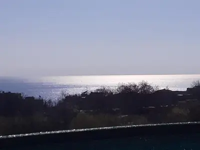 a view of the ocean from a hill at Sunshine Byala in Byala