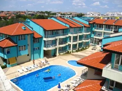 an overhead view of a swimming pool with buildings at Nev 1 in Burgas City