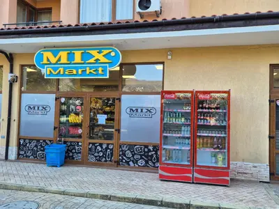 a mis market store with two soda machines in front at Luxor Zaks Apartments in Sveti Vlas