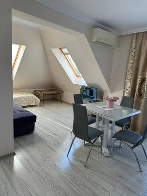 a living room with a table and chairs at Persani 3 Sanny Beach in Sunny Beach