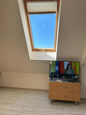 a living room with a tv and a window at Persani 3 Sanny Beach in Sunny Beach
