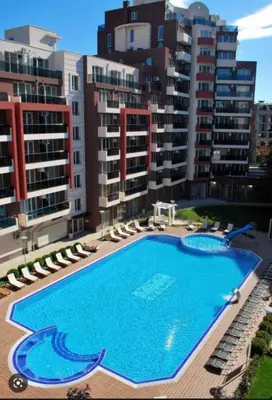 a large swimming pool in front of some buildings at Студия в Болгарии Солнечный берег in Sunny Beach