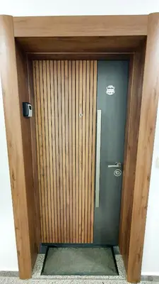 a wooden door in a room with a glass at Sunshine Rose - Sea view, Neubau, Luxus Apartment in Sveti Vlas