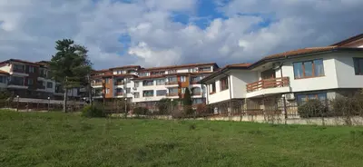 a group of apartment buildings in a field at Hills view apartment in Sunny Beach