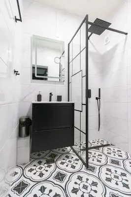 a bathroom with a sink and a mirror at Green Dream Apart in Varna City