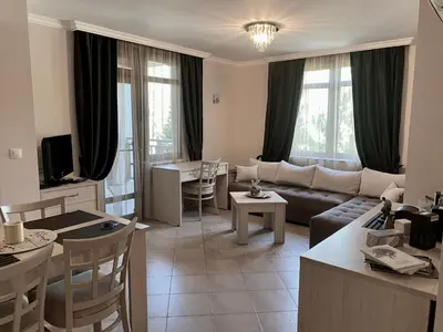 a living room with a couch and a table at AJ Apartment 8, Santa Marina Holiday Village, Sozopol in Sozopol