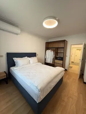 a bedroom with a large bed in a room at Aparthotel Sveti Nikola in Pomorie
