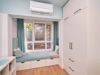 a childs room with a window seat in front of a window at n17 Garden - Parking - WorkDesk - Blackout Rolls- Netflix - Wash&Dry in Burgas City