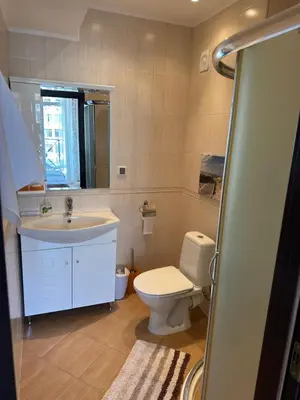 a bathroom with a toilet and a sink at 2 bedroom apartment komplex Andalusia Elenite with terrasa and sea in Sveti Vlas