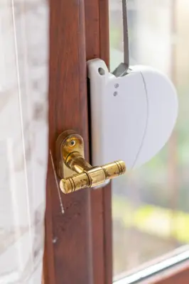 a wooden door with a gold door knob at Lidia Odrin by RV Apartments in Varna City