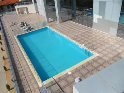 an overhead view of a large blue swimming pool at Amazing panorama sea view apartment in Byala