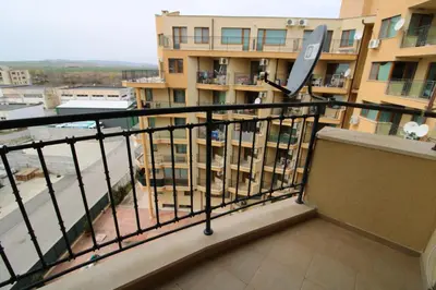 a balcony with a view of a building at Amadeus 5 - Menada Apartments in Sunny Beach