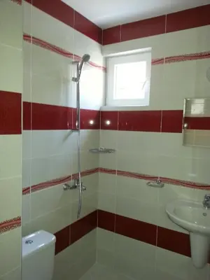 a bathroom with a shower and a sink at Guest House Nedelchevi in Primorsko