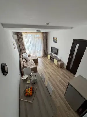 an overhead view of a living room with a table at Sea View Apartment Sveti Vlas 1 Bedroom K&R in Sveti Vlas