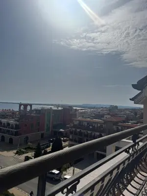 a view of a city from a balcony at Sea View Apartment Sveti Vlas 1 Bedroom K&R in Sveti Vlas