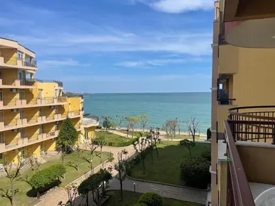 a view of the ocean from a balcony of a building at The Royal Bay Hideaway Studio in Aheloy