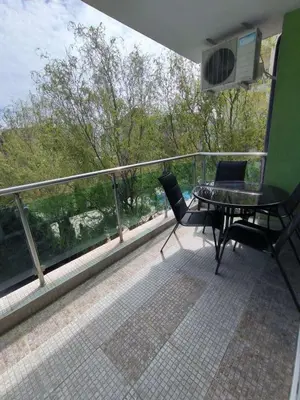 a balcony with a table and chairs on a balcony at complex Sol Marine sunny beach in Sunny Beach