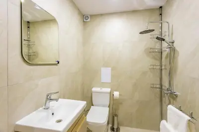 a bathroom with a sink and a toilet and a shower at J'ADORE Secret Garden A&K Deluxe Studio in Sunny Beach