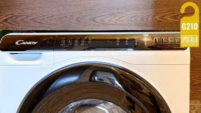 a close up of a front loading washing machine at ROYAL BEACH - Private Apartments - Center of Sunny Beach in Sunny Beach