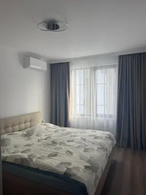 a bedroom with a bed and a window at Meerblick , Etera 4 in Sunny Beach