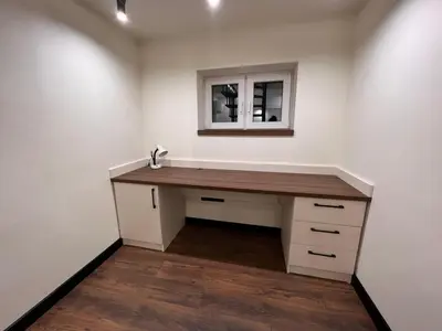 a desk in a room with a window at Maxim Apartment with Free Parking in Varna City