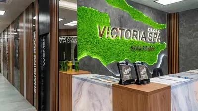 a vaporetto spa with a green sign on the wall at Solea Studio in Chernomorets