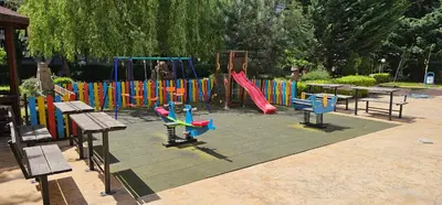 a park with a playground with a slide at Rainbow 2 studio 40 in Sunny Beach