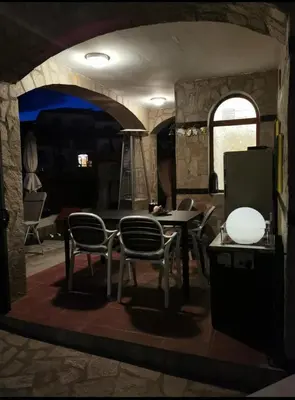 a kitchen with a table and chairs in a room at Exklusive Villa am Sonnenstrand Bulgarien am Schwarzen Meer aheloy Cabernet 1 in Kableshkovo