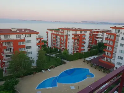 a view from a balcony of some apartment buildings at Double Peach Apartment in Sveti Vlas