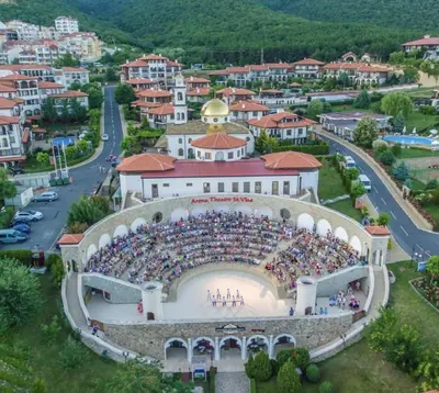 an aerial view of a large amphitheater in a city at Panorama Sea View in Sveti Vlas