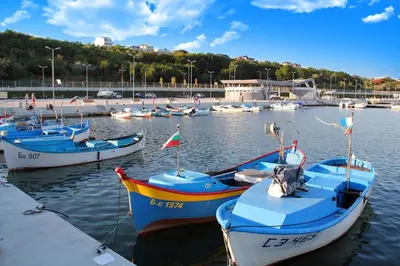 a group of boats are docked in a harbor at Апартамент в непосредствена близост до плажа III in Burgas City