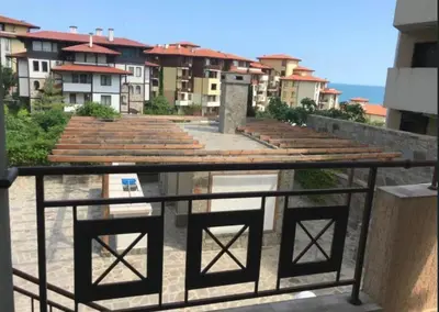 a view of a city from a balcony with buildings at Apartment in complex Sirena! in Sveti Vlas