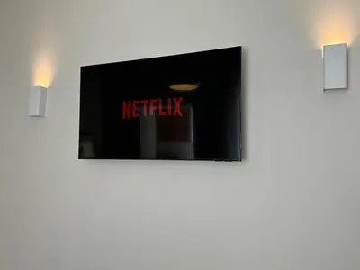 a sign that says netflix on a wall at Heart of Varna, Close to the Sea in Varna City