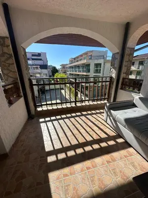 a balcony with a view of a city at Apartment in the complex Olymp in Sveti Vlas