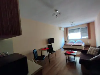 a living room with a couch and chairs at Studio Zora in Burgas City