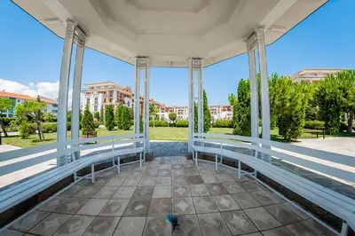 an empty porch with a view of a building at Private Apartment 171 in Prestige Fort Beach Hotel in Sveti Vlas
