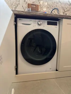 a washing machine under a counter in a kitchen at Apartment Summer Vibes in Sveti Vlas