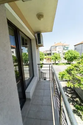 a balcony of a building with a view of a street at GGeorgi Sarafovo in Burgas City
