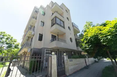 a tall building with a fence in front of it at GGeorgi Sarafovo in Burgas City