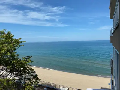 a view of the beach from a building at Зора-Обзор in Obzor