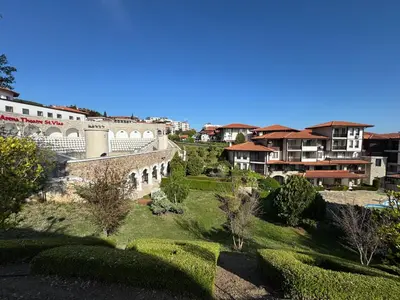a view of a city with houses and gardens at Arena I by the Sea in Sveti Vlas
