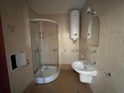 a bathroom with a shower and a sink at Rose Village Apartment in Sunny Beach